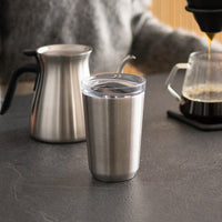 stainless steel to go tumbler by kinto on table